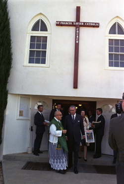 President Lyndon B. Johnson and Lady Bird Johnson attend Mass